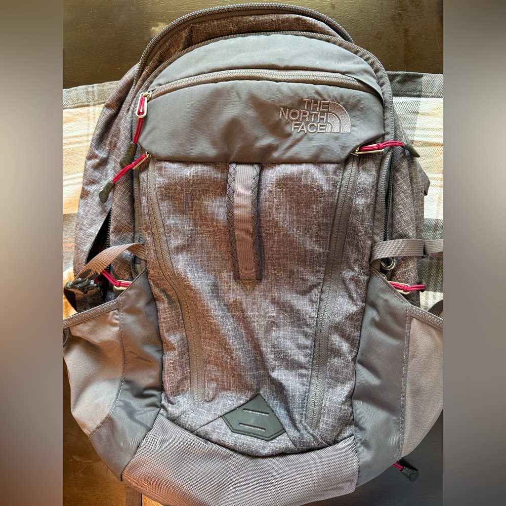 The North Face women’s Surge S25 Commuter Laptop Backpack Gray Pink